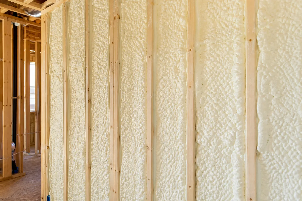 Finished spray foam insulation in wall stud bays for a Yakima FAQ